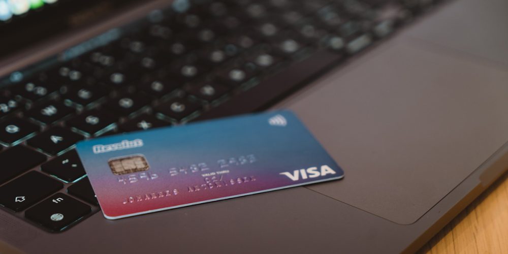 credit card shown on a laptop keyboard