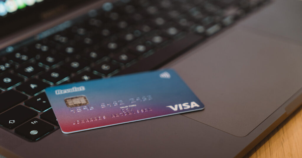 credit card shown on a laptop keyboard